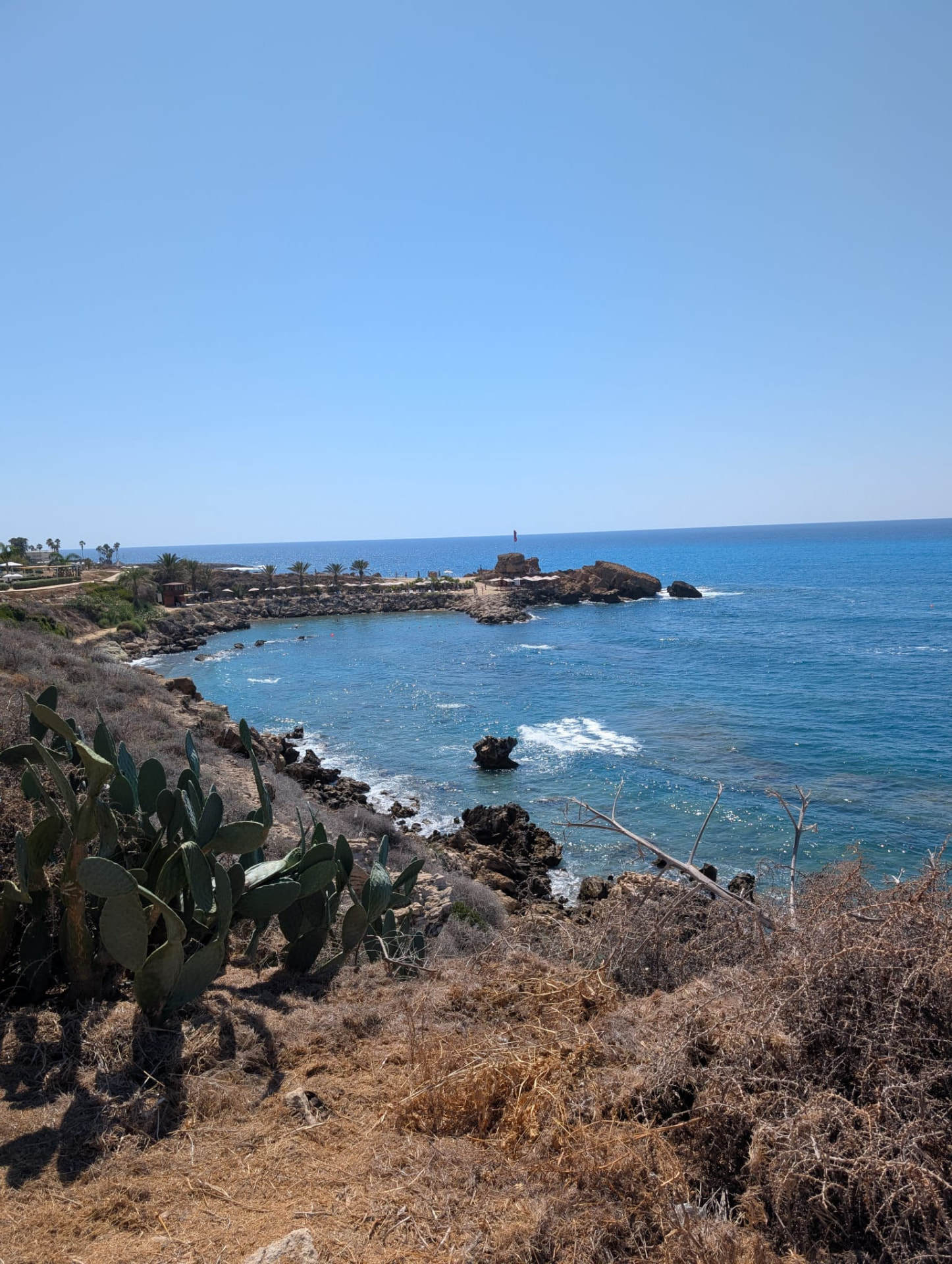 Rocky Mediterranean coastline with blue sea and clear sky